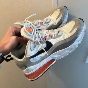 Nike White and Gray Shoes with Orange Highlights